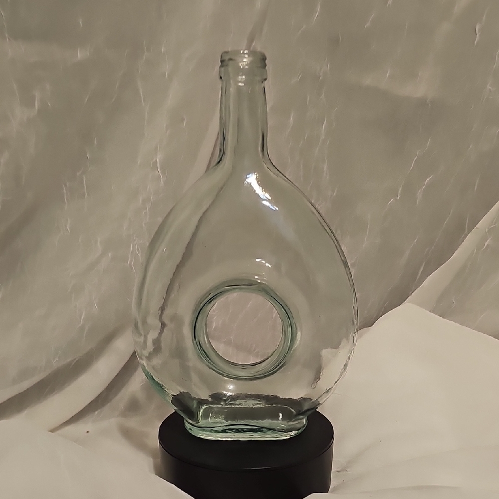 Unique Clear Glass Bottle with Circular Design